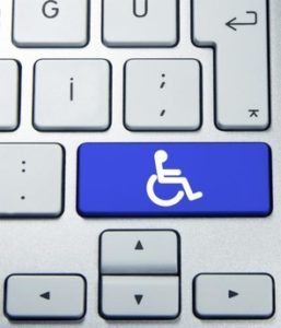 Blue accessibility symbol showing a person using a wheelchair.